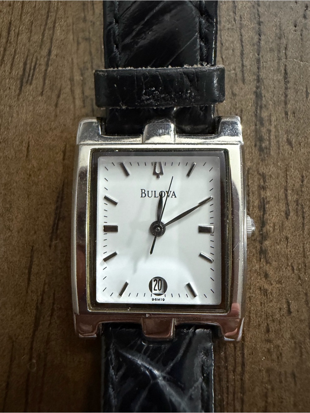 Vintage men’s Bulova Silver Square Case White Dial Black Leather Strap Watch